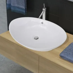 Sanitair & Loodgietersbenodigdheden*vidaXL Keramische wastafel ovaal 59 x 38,5 cm Wit